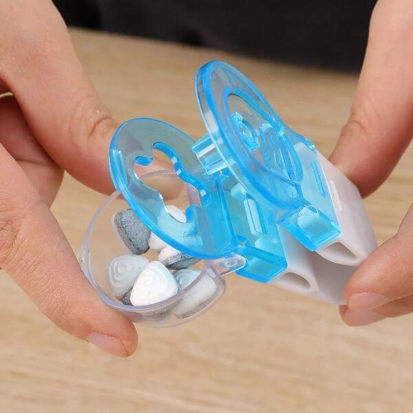 PORTABLE PILL EXTRACTOR